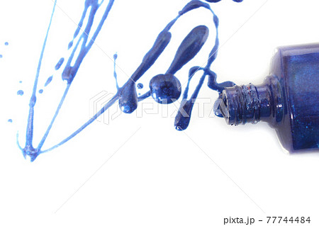 Spilled Blue Nail polish on White 77744484