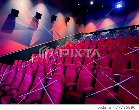 Alternative seating marks for social distancing at the cinema . 77755996