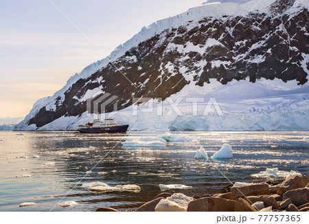 Touristic antarctic cruise liner drifting in the lagoon among th Touristic antarctic cruise liner drifting in the lagoon among th 77757365