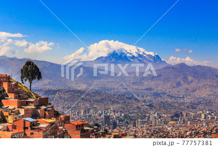 view to the snow cap of Illimani peak and valley full of living 77757381