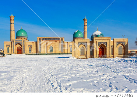 Snow and blue domes and minarets of Hazrati Imam complex, religious center of Tashkent, Uzbekistan 77757465