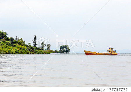 Cargo ship anchored at the shore, Kivu lake, Rwanda Cargo ship anchored at the shore, Kivu lake, Rwanda 77757772