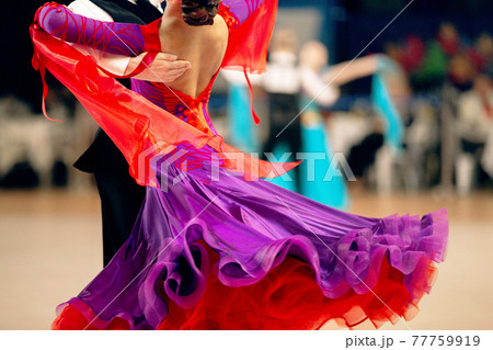 couple of dancers dancing waltz in dancesport competition 77759919
