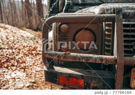 Closeup photo of off road car in mountains 77766166