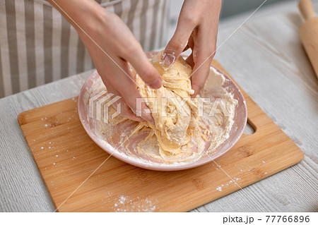 housewife cooking on kitchen at the home. 77766896