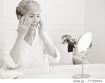 Senior asian woman who skin care at home. 77768892