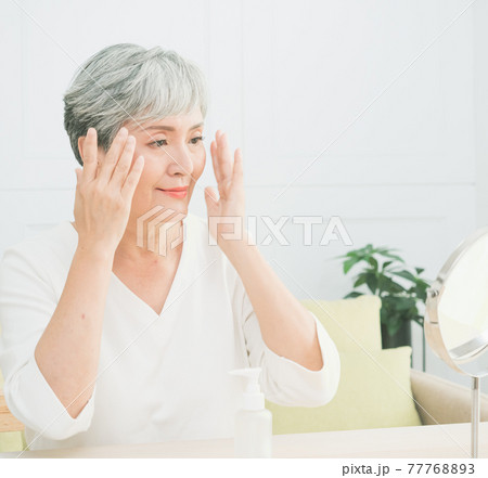 Senior asian woman who skin care at home. 77768893