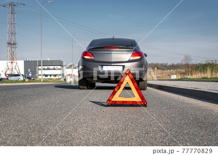 Car accident triangle. Auto vehicle broken down on road. Motor car problem concept. 77770829