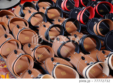 SEREMBAN, MALAYSIA -APRIL 15, 2017: Malay traditional sandals for men. It is handcrafted using animal skins. SEREMBAN, MALAYSIA -APRIL 15, 2017: Malay traditional sandals for men. It is handcrafted using animal skins. 77772732