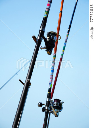 PORT DICKSON, MALAYSIA -APRIL 28, 2017: Fishing rods complete with the motor used by fisherman. These rods are used to fish in coastal fishing. PORT DICKSON, MALAYSIA -APRIL 28, 2017: Fishing rods complete with the motor used by fisherman. These rods are used to fish in coastal fishing. 77772818