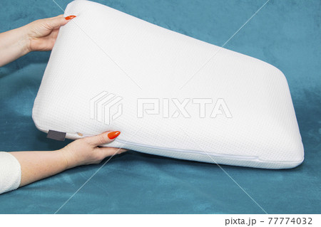 close-up of white pillows, pillow production, pillow selection. 77774032
