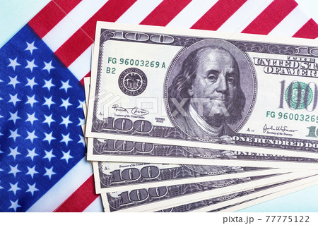 USA dollars background. American rescue plan, USA relief program, stimulus check and Act of 2021 concept. Money, business, profit and livelihood idea  77775122