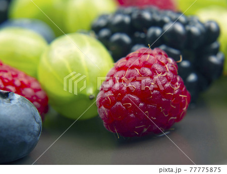 lots of fresh different berries. useful vitamin healthy food fruit. healthy vegetable breakfast 77775875