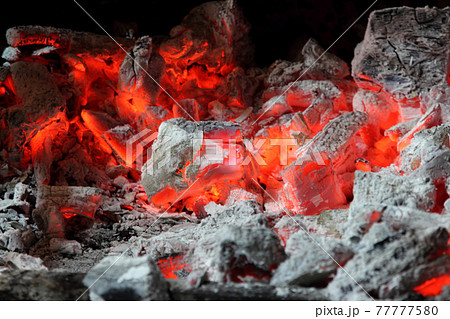 burning red coals of a fire burning red coals of a fire 77777580
