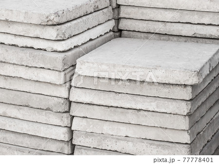 Old gray concrete plates. Building cement materials at the construction site 77778401