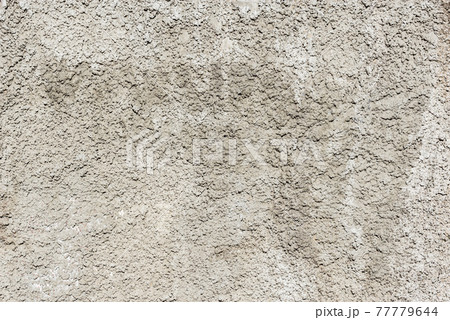 Gray background of the cement wall texture. Gray background of the cement wall texture. 77779644