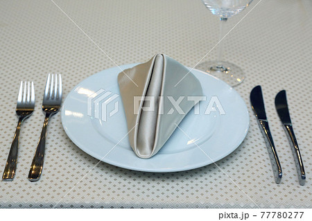 the table setting in restaurant the table setting in restaurant 77780277