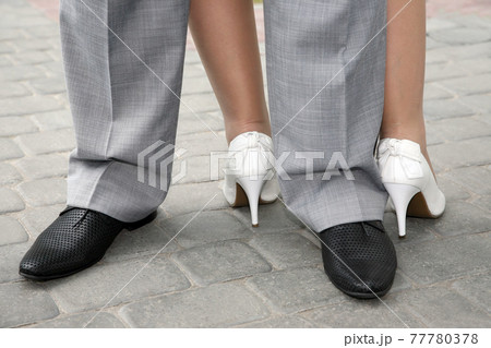 men's and women's shoes dressed to the people 77780378