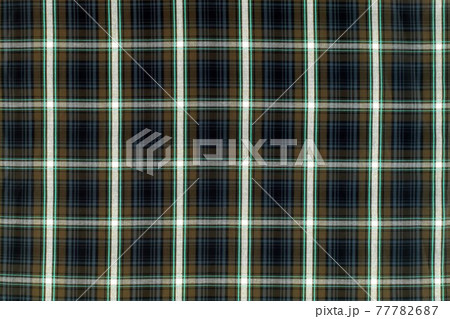 Texture cotton colored fabric in a cage. Background abstraction Texture cotton colored fabric in a cage. Background abstraction 77782687