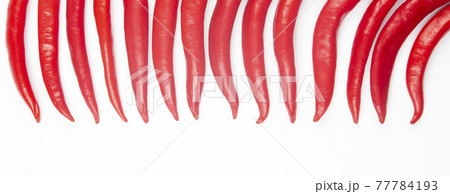 Red hot chili peppers on a white background. food figures. Vitamin vegetable food 77784193