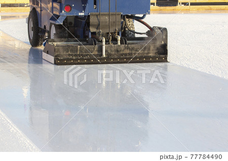 special machine for cleaning ice on an ice rink at work. Transport industry special machine for cleaning ice on an ice rink at work. Transport industry 77784490