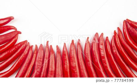 Red hot chili peppers on a white background. food figures. Vitamin vegetable food 77784599