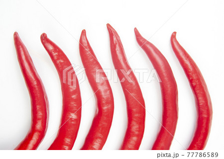 Red hot chili peppers on a white background. food figures. Vitamin vegetable food 77786589