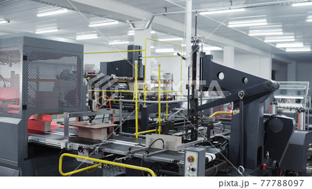 Conveyor line for the production of boxes. Machine carves and bends cardboard boxes from sheets of cardboard. Enterprise for the production package 77788097