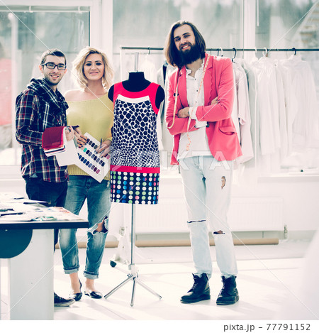 group for fashion designers in Studio on a background of new mod 77791152