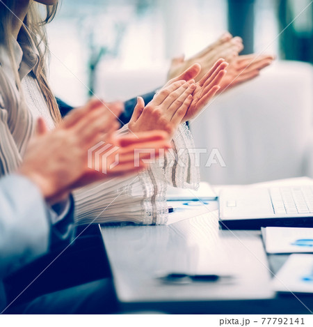 Close-up of business people clapping hands. Business seminar Close-up of business people clapping hands. Business seminar 77792141
