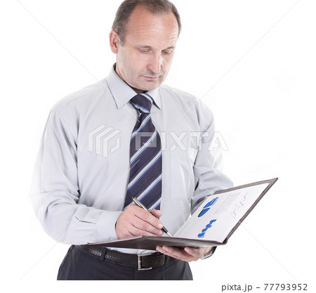 confident businessman with a leather folder .isolated on white 77793952