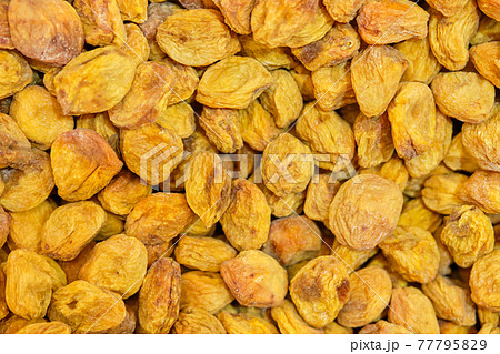Background texture of dried apricots. Top view. Background texture of dried apricots. Top view. 77795829