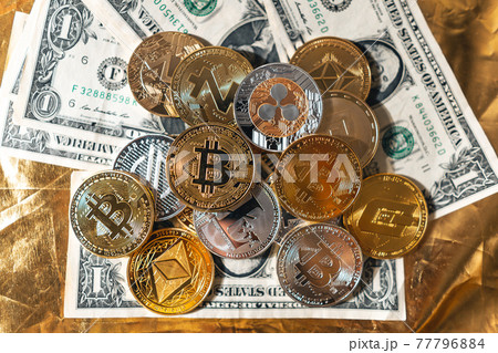 Crypto coins on gold background 77796884