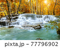 Colorful majestic waterfall in national park forest during autumn - Image 77796902