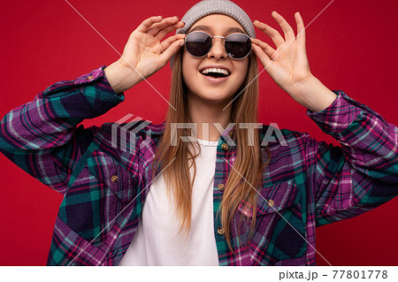 Photo shot of beautiful positive young brunette woman wearing summer casual clothes and stylish 77801778