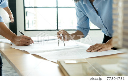 architect or engineer working on table use drawing tool architect or engineer working on table use drawing tool 77804781
