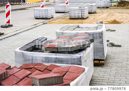 paving with paving stones of different colors, view of the construction site paving with paving stones of different colors, view of the construction site 77809978