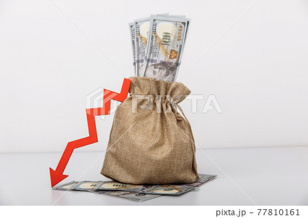 Money bag and red down arrow. Economic difficulties concept 77810161