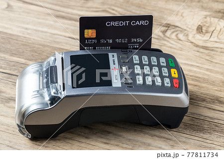 Credit card swiping machine to pay. Credit card swiping machine to pay. 77811734