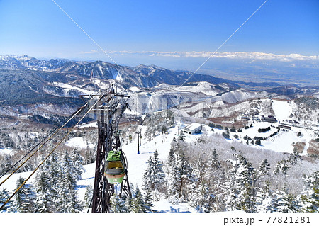 東館山スキー場より北アルプス方面を望む(志賀高原)【2021.3】 77821281