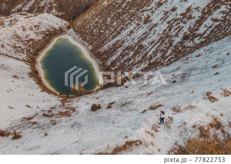 A lake formed on phosphogypsum waste, a tourist find in Ukraine, white mountains from phosphate waste. A lake formed on phosphogypsum waste, a tourist find in Ukraine, white mountains from phosphate waste. 77822753