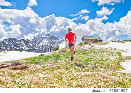 Marathon window runner trains in the mountains in altitude Marathon window runner trains in the mountains in altitude 77824997