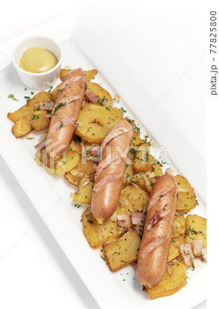 german cheese sausages with fried potato and mustard 77825800
