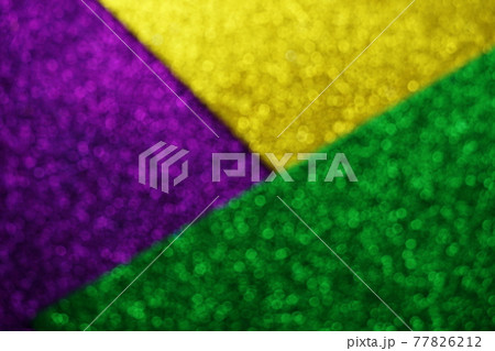 Mardi Gras with Green Purple and gold Light bokeh Background Mardi Gras with Green Purple and gold Light bokeh Background 77826212
