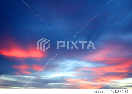 Colorful sunset with clouds in the evening 77828531