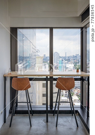 Wooden desk with chairs at corner modern office 77836545