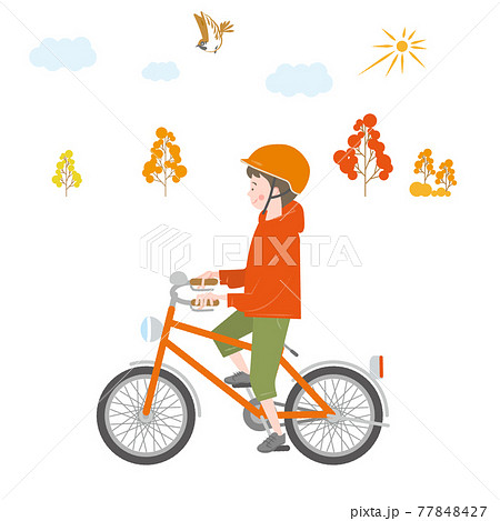 秋の屋外で自転車に乗る男の子のイラスト素材