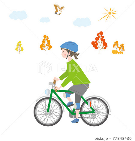 秋の屋外で自転車に乗る女の子のイラスト素材