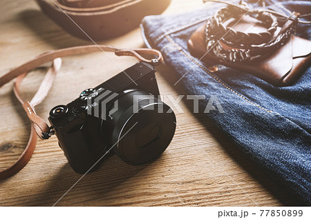 mirrorless camera with leather strap 77850899