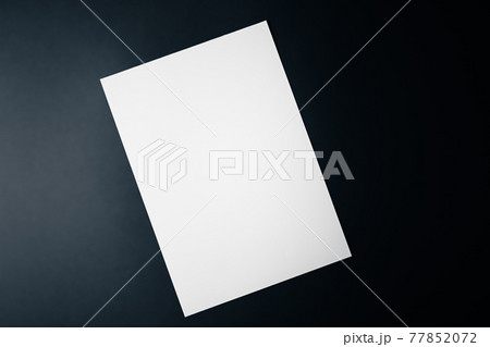 Blank A4 paper, white on black background as office stationery flatlay, luxury branding flat lay and brand identity design for mockup 77852072